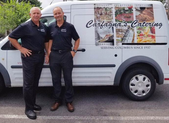 photo of Sam and Dino with catering truck